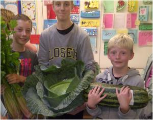 Ronan , Aaron and Nathan with their giant veg buys